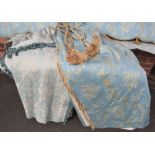 A PAIR OF BLUE & CREAM PATTERNED INTERLINED CURTAINS WITH GOLD TASSEL EMBELLISHMENT AND TASSEL TIE