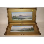 A PAIR OF GILT FRAMED AND GLAZED WATERCOLOURS OF MOUNTAINOUS SCENES ENTITLED 'MORNING MIST' AND '
