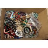 A LARGE BOX OF COSTUME JEWELLERY