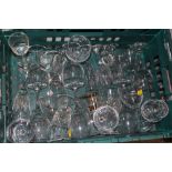 A TRAY OF DRINKING GLASSES TO INCLUDE CUT GLASS EXAMPLES