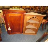 AN ANTIQUE MAHOGANY HANGING CORNER CUPBOARD AND AN OPEN PINE EXAMPLE (2)