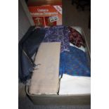 A SUITCASE OF VINTAGE TEXTILES AND FABRIC