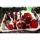 A COLLECTION OF DECORATIVE RED GLASS VASES TO INCLUDE HAND PAINTED EXAMPLES