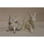 TWO BESWICK FIGURES COMPRISING A SEATED PIG AND A KID GOAT (2)