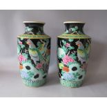 A PAIR OF ORIENTAL HIGH SHOULDERED FAMILLE NOIR VASES, having character marks to base, H 30 cm