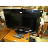 A PANASONIC VIERA 32" FLATSCREEN TV - REMOTE