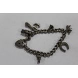 A VINTAGE HALLMARKED SILVER CHARM BRACELET APPROX WEIGHT - 30.3G