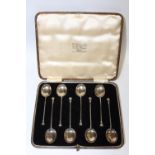 A CASED SET OF EIGHT HALLMARKED SILVER SEAL TOP COFFEE SPOONS