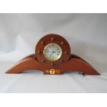 A MANTLE CLOCK MADE FROM THE PROPELLER OF A 1917 AIRCRAFT, in two parts with key, L 69 cm, H 28 cm