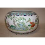 AN ORIENTAL CHINESE STYLE LOW BOWL, with scenes of children playing and flying kites, character mark