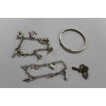 TWO SILVER CHARM BRACELETS, TOGETHER WITH A SILVER BANGLE AND A SMALL SILVER BRACELET (4) APPROX