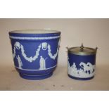 A LARGE WEDGWOOD BLUE DIP JASPERWARE JARDINIERE TOGETHER WITH A SIMILAR CRACKER BARREL DECORATED