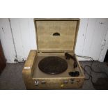 A VINTAGE COLLARO MICROGRAM RECORD PLAYER WITH BAKELITE ARM