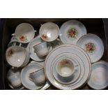 A TRAY OF PORTLAND POTTERY ROSE PATTERN CHINA