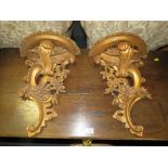 A PAIR OF GILT WALL BRACKETS, H ?? cm (2)