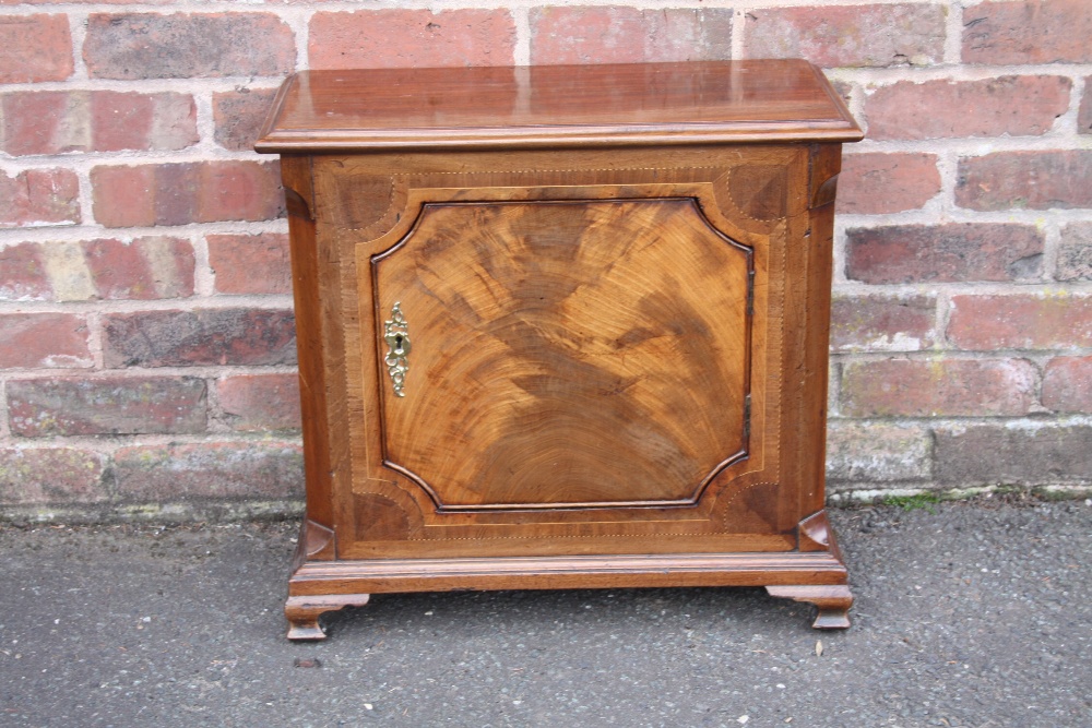 A SMALL ANTIQUE MAHOGANY AND INLAID SIDE CABINET, converted from a longcase clock, H 57 cm, W 61 cm,