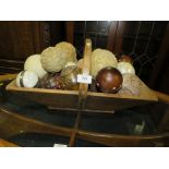 A CONTEMPORARY RUSTIC STYLE TRUG WITH DECORATIVE BAUBLES