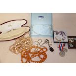 A BOX OF COSTUME JEWELLERY, COINS AND MEDALS ETC.