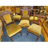 A SET OF FOUR EDWARDIAN CARVED OAK DINING CHAIRS AND TWO OTHER CHAIRS (6)