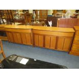 A PAIR OF 'NATHAN' MODERN TEAK BOW-FRONTED SIDEBOARDS H-81 W-135 D-49 CM (2)