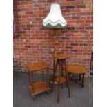 AN OAK STANDARD LAMP, TWO OCCASIONAL TABLES AND A JARDINAIRE STAND (4)