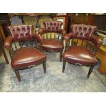A SET OF THREE EARLY 20TH CENTURY OAK LEATHER TUB ARMCHAIRS WITH UNUSUAL PLATED NAME PLAQUES TO