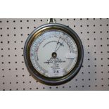 A DOLLOND OF LONDON CIRCULAR FISHERMAN'S ANEROID BAROMETER, DIA. 15.5 CM