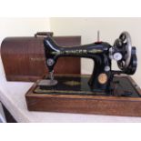 A VINTAGE SINGER SEWING MACHINE