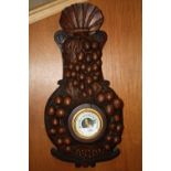 A HEAVILY CARVED OAK WALL BAROMETER WITH GRAPE DETAIL, H 54 CM