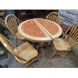 A MODERN KITCHEN EXTENDING TABLE AND FOUR CHAIRS