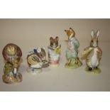 A COLLECTION OF FIVE BESWICK BEATRIX POTTER FIGURES, TO INCLUDE A GOLD STAMPED TAILOR OF