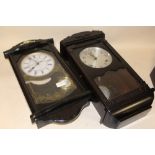 TWO WALL CLOCKS, TO INCLUDE A PLASTIC EXAMPLE