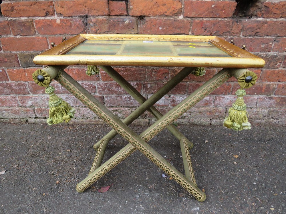 AN UNUSUAL GILT AND GLAZED TWIN HANDLED BUTLERS TRAY ON STAND