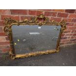 A LARGE CONTEMPORARY GILT OVERMANTLE MIRROR H-86 W-110 CM