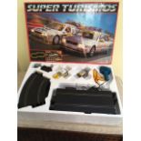 A 'SUPER TURISMOS' SCALEXTRIC SET, TOGETHER WITH ADDITIONAL CARS, ACCESSORIES AND EXTRA TRACK