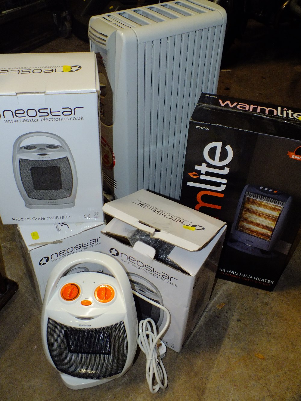 FOUR BOXED ELECTRIC HEATERS PLUS ANOTHER