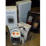 FOUR BOXED ELECTRIC HEATERS PLUS ANOTHER