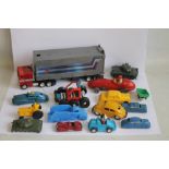 A VINTAGE OPTIMUS PRIME TRANSFORMER, three vintage metal cars including two American made and ten