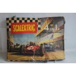 A BOXED LATE 1960S SCALEXTRIC SET, FOUR LANE, with 4 cars , instructions