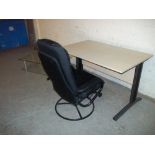 A LEATHER SWIVEL RECLINER, A GLASS COFFEE TABLE AND AN IKEA STYLE DESK