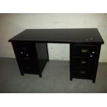 A MODERN TWIN PEDESTAL DESK