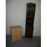 A NARROW OAK BOOKSHELF AND A FOUR DRAWER CHEST OF DRAWERS, two over two with contents