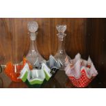 TWO GLASS DECANTERS AND FIVE GLASS HANDKERCHIEF VASES