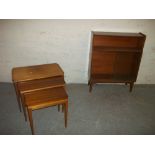 A SAPELE / MAHOGANY DISPLAY BOOKCASE WITH SLIDING GLASS DOORS AND A NEST OF TABLES