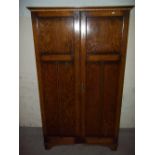 AN OAK WARDROBE