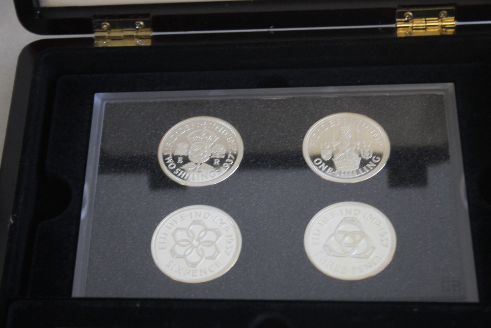 A COLLECTION OF BOXED COMMEMORATIVE COINS, to include three Edward VIII retro sets, a set of St - Image 3 of 6