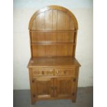 AN OAK ARCHED DISPLAY DRESSER