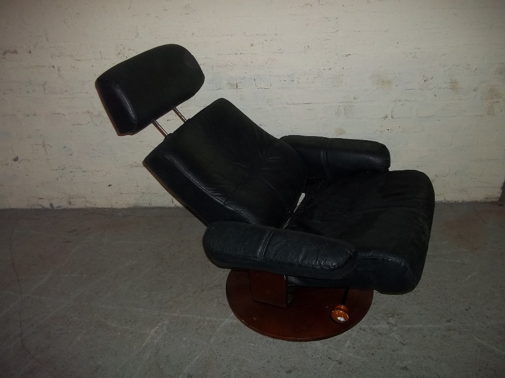 A LARGE BLACK LEATHER SWIVEL RECLINING CHAIR WITH ADJUSTABLE HEADREST - Image 2 of 4