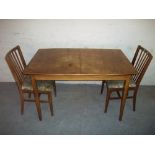 A TEAK EXTENDING DINING SET WITH TWO CHAIRS