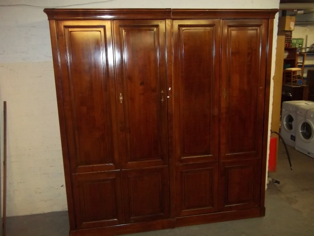 A PAIR OF CHERRYWOOD FULL LENGTH WARDROBES W 214 CM, H 223 CM, D 60 CM, one unit but can be split